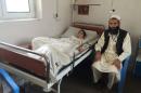 Afghan boy receiving treatment at Medicines Sans Frontiers after mortar exploded in yard, and recovering from a drug-resistant bacterial infection, lies in an isolation ward in Kunduz