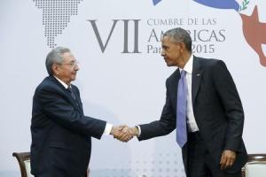 File photo of Obama shaking hands with Castro as they &hellip;