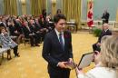 Canadian Prime Minister Justin Trudeau takes the oath of office at Rideau Hall in Ottawa on November 4, 2015