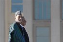 Karzai and Panetta stand for a full honors welcome at the Pentagon in Arlington, Virginia