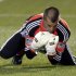 San Jose Earthquakes goalie Jon Busch stops a shot during the first half of an MLS soccer match against the Portland Timbers in Portland, Ore., Sunday, April 14, 2013. (AP Photo/Don Ryan)