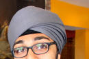 This 2014 photo provided by the American Civil Liberties Union shows Hofstra University student Iknoor Singh, who sued the Army last year, claiming his goal of someday working in military intelligence was being stymied by the Army's policy. A federal judge has now ordered the Sikh college student from New York be permitted to enroll in the U.S. Army's Reserve Officer Training Corps without shaving his beard, cutting his hair, or removing his turban. (American Civil Liberties Union via AP)