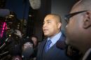 Miami Dolphins lineman Jonathan Martin speaks to members of the media outside the office of the NFL lawyer investigating the team's bullying scandal, Friday, Nov. 15, 2013, in New York. The league is trying to gather information about the harassment Martin says he was subjected to by teammate Richie Incognito. (AP Photo/John Minchillo)