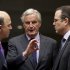 European Commissioner for Internal Market Michel Barnier, center, speaks with French Finance Minister Pierre Moscovici, left, and Sweden's Finance Minister Anders Borg during a meeting of EU finance ministers at the EU Council building in Brussels on Tuesday, Nov. 13, 2012. Shoring up Europe's banking sector and strengthening oversight of economic policies will likely top the agenda of a meeting Tuesday of the European Union's 27 finance ministers. (AP Photo/Virginia Mayo)
