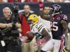 Green Bay Packers wide receiver James Jones pulls in a touchdown pass in front of Houston Texans cornerback Kareem Jackson during their NFL game in Houston