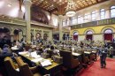 Assembly Members debate before voting on legislation called New York Secure Ammunition and Firearms Enforcement Act in Albany