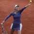 Russia's Maria Sharapova prepares to serve against Canada's Eugenie Bouchard in their second round match at the French Open tennis tournament, at Roland Garros stadium in Paris, Thursday, May 30, 2013. (AP Photo/Petr David Josek)