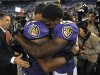 Baltimore Ravens linebacker Ray Lewis, left, hugs wide receiver Torrey Smith after an NFL football game against the New England Patriots in Baltimore, Monday, Sept. 24, 2012. Baltimore won 31-30. Smith, who was playing less than 24 hours after the death of his 19-year-old brother, had six catches for 127 yards and two touchdowns for the Ravens. (AP Photo/Gail Burton)