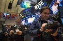 Traders work on the floor of the New York Stock Exchange