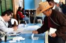 A man casts his vote at a polling station in San Juan Sacatepequez, Guatemala, during general elections on September 6, 2015