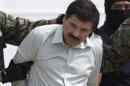 FILE - This Feb. 22, 2014 file photo shows Joaquin "El Chapo" Guzman, the head of Mexico's Sinaloa Cartel, being escorted to a helicopter in Mexico City following his capture overnight in the beach resort town of Mazatlan. On Monday, Nov. 24, 2014, at federal court in Chicago, a U.S. judge sentenced Alfredo Vasquez-Hernandez, a reputed lieutenant of Guzman, to 22 years in prison for his role in a $1 billion trafficking conspiracy, saying the stiff sentence should send a message to traffickers everywhere. The case is regarded as one of the U.S. government's most important against Mexican cartels. Guzman remains jailed in Mexico and Mexican authorities haven't said if they might extradite him to Chicago. (AP Photo/Eduardo Verdugo, File)