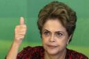 Brazil's President Rousseff gestures during a meeting with social movements at Planalto Palace in Brasilia