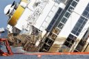The capsized Costa Concordia cruise liner is pictured after the start of the "parbuckling" operation outside Giglio harbour