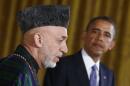 Afghan President Karzai addresses a joint news conference with U.S. President Obama at the White House in Washington