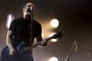 In this March 27, 2014 photo, Trent Reznor of Nine Inch Nails performs at the Vive Latino music festival in Mexico City, Mexico. Reznor says he feels 