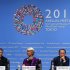 Poland's Central Bank Governor Marek Belka, International Monetary Fund Managing Director Christine Lagarde and World Bank Group President Jim Yong Kim attend their joint news conference in Tokyo