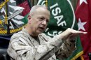 FILE - This July 22, 2012 file photo shows U.S. Gen. John Allen, top commander of the NATO-led International Security Assistance Forces (ISAF) and US forces in Afghanistan gestures during an interview with the Associated Press in Kabul, Afghanistan. A diminished but resilient al-Qaida, whose 9/11 attacks drew America into its longest war, is attempting a comeback in the country's mountainous east even as U.S. and allied forces wind down their combat mission and concede a small but steady toehold to the terrorist group. (AP Photo/Musadeq Sadeq, File)