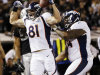 Denver Broncos tight end Joel Dreessen (81) reacts after scoring a touchdown on a 6-yard pass from quarterback Peyton Manning during the first quarter of an NFL football game against the Oakland Raiders in Oakland, Calif., Thursday, Dec. 6, 2012. At right is Broncos tackle Orlando Franklin. (AP Photo/Marcio Jose Sanchez)