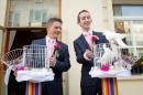 Phil Robathan (left) and James Preston release doves following their wedding ceremony in Brighton, southern England, on March 29, 2014