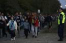 Migrants cross Austrian-Hungarian border into Nickelsdorf