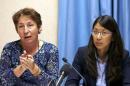 Saulnier MSF legal counsel gestures next to Liu President of MSF International during a news conference in Geneva