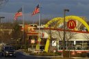 A retro McDonalds restaurant is seen next to a Chick-fil-A in Arundel Mills