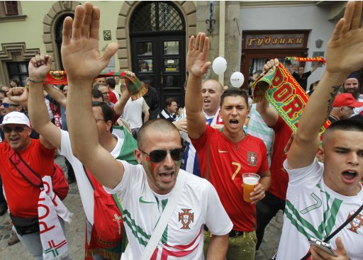 Portuguese fans drink beer and sing in central Lviv