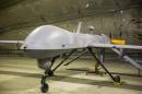 A MQ-1B Predator Unmanned Aerial System vehicle that is part of Task Force Odin, stands inside a hangar at Bagram Air Field in the Parwan province of Afghanistan