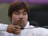 South Korea's Im Dong-hyun takes aim during the men's archery individual ranking round of the London 2012 Olympics Games at the Lords Cricket Ground in London
