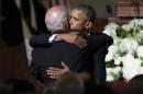 U.S. President Obama kisses Vice President Biden on the cheek after delivering the eulogy during the funeral of Biden's son former Delaware Attorney General Beau Biden in Wilimington, Delaware