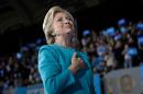 Democratic presidential nominee Hillary Clinton acknowledges supporters after speaking a rally on November 6, 2016 in Cleveland, Ohio