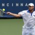 Roddick of the U.S. hits a return to Chardy of France during their first round match in the 2012 Cincinnati Open tennis tournament in Cincinnati