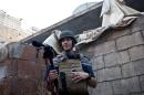 This handout picture courtesy of Nicole Tung taken on November 5, 2012 in Aleppo shows US freelance reporter James Foley