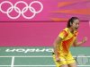 China's Yihan Wang celebrates winning against India's Saina Nehwal during their womens singles badminton semifinals match during the London 2012 Olympic Games at the Wembley Arena