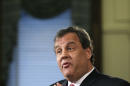 This photo taken Jan. 9, 2014, shows New Jersey Gov. Chris Christie gesturing as he answers a question during a news conference at the Statehouse in Trenton. Christie will propose extending the public school calendar and lengthening the school day in a speech he hopes will help him rebound from an apparent political payback scheme orchestrated by key aides. The early front-runner for the 2016 Republican presidential nomination will make a case Tuesday Jan. 14, 2014, that children who spend more time in school graduate better prepared academically, according to excerpts of his State of the State address obtained by The Associated Press. (AP Photo/Mel Evans)
