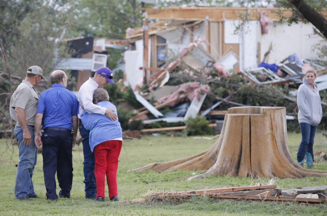 Tornadoes hit Oklahoma, Kansas and Nebraska Tornadoes raked the southern Plains Wednesday, overturning cars on an Oklahoma City interstate and destroying dozens of homes. No deaths were immediately reported from the tornadoes that hit Oklahoma and rural parts of Kansas and Nebraska The worst damage seemed to be in the Oklahoma City area. A twister destroyed homes at Bridge Creek, Amber and Blanchard, southwest of the city, and it appeared another tornado touched down later Wednesday evening when a second storm came through the area. “We have damage reports, so we do strongly think there was a tornado on the south side of Oklahoma City,” meteorologist Michael Scotten with the National Weather Service in Norman said after the second storm that hit around 8:40 p.m. That storm flipped vehicles on Interstate 35 and left power lines strewn across the roadway, Scotten said. It wasn’t immediately clear whether anyone was hurt. The Oklahoma Highway Patrol and an ambulance company spokeswoman both said emergency personnel were sent to the scene, though no injuries were immediately reported. In Grady County, about 25 miles southwest of Oklahoma City, a zoo was hit by a tornado, prompting concerns that animals could be on the loose. Alisa Voegeli, a dispatcher at the sheriff’s office, said the zoo’s owner and a deputy were on scene Wednesday night inspecting the damage. Another threat also loomed: flooding. The storms dumped up to 6 inches in the southern part of Oklahoma City, prompting the city to issue a flash flood emergency for the first time in its history, said city spokeswoman Kristy Yager. Road crews were waiting for the storms to abate to set up barricades and evaluate trouble spots. “They’ll dispatch as soon as the storms end and the weather clears,” Yager said. The Storm Prediction Center had warned that bad weather would come to Tornado Alley, and more storms were possible later in the week, with flooding a major concern. “People just really need to stay weather aware, have a plan and understand that severe storms are possible across portions of the southern Plains almost daily through Saturday,” National Weather Service meteorologist Jonathan Kurtz said. In Oklahoma, Grady County Emergency Management Director Dale Thompson said about 10 homes were destroyed in Amber and 25 were destroyed in Bridge Creek. As the storm moved to the east, forecasters declared a tornado emergency for Moore, where seven schoolchildren were among 24 people killed in a storm two years ago. When the first of the storms moved through Wednesday, school districts held their pupils in safe places. At Will Rogers World Airport in Oklahoma City, people were twice evacuated into a tunnel outside the security zone. In Nebraska, 10 to 15 homes were damaged near Grand Island, and between Hardy and Ruskin, near the Kansas line. At least nine tornadoes were reported in Kansas, the strongest of them in the sparsely populated north-central part of the state. That included a large tornado near the tiny town of Republic just south of the Nebraska state line, where some homes were damaged. In Harvey County, a tornado destroyed a hog barn and damaged trees, according to the National Weather Service. (AP) 
 Photos by: (from top) 
 Travis Heying/The Wichita Eagle via AP (2), Sue Ogrocki/AP,  Mark Wilson/AFP 
 See more 
 photos of the tornadoes 
 and our 
 other slideshows 
 on Yahoo News.