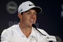 Rory McIlroy, of Northern Ireland, speaks to the media during a news conference before a practice round for the PGA Championship golf tournament at Valhalla Golf Club on Tuesday, Aug. 5, 2014, in Louisville, Ky. The tournament is set to begin on Thursday. (AP Photo/Jeff Roberson)
