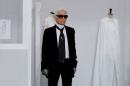 German designer Karl Lagerfeld appears at the end of his Haute Couture Fall Winter 2016/2017 fashion show for Chanel in Paris