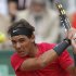 Rafael Nadal of Spain returns in his second round match against Denis Istomin of Uzbekistan at the French Open tennis tournament in Roland Garros stadium in Paris, Thursday May 31, 2012. (AP Photo/Bernat Armangue)
