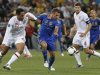 Ukraine's Shevchenko challenges England's Lescott and Gerrard during their Group D Euro 2012 soccer match at the Donbass Arena in Donetsk