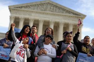 Families stage a prayer vigil and rally in front of &hellip;