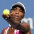 Venus Williams of the U.S. serves to Chanelle Scheepers of South Africa during a their second round match in the 2012 Cincinnati Open tennis tournament in Cincinnati