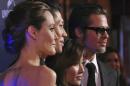Angelina Jolie, cast member Miyavi, his wife Melody Ishihara and Brad Pitt attend the world premiere of Jolie's film "Unbroken" in Sydney