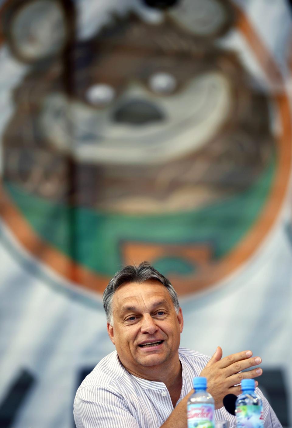 In this picture taken Saturday, July 26, 2014, Hungarian Prime Minister Viktor Orban delivers his speech at the 25th Balvanyos Summer University and...