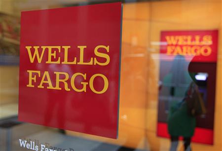 A Wells Fargo sign is seen outside a banking branch in New York in this July 13, 2012, file photo. The U.S. Attorney in Manhattan and the U.S. Department of Housing and Urban Development filed a civil mortgage fraud lawsuit against Wells Fargo & Co in the latest legal volley against big banks for their lending during the housing boom, October 9, 2012. REUTERS/Shannon Stapleton/Files