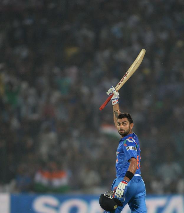 Indian batsman Virat Kohli gestures after win during the 2nd ODI match between India and Australia being played at Sawai Mansingh Stadium, Jaipur on Oct. 16, 2013. (Photo: IANS)