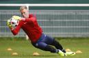 FILE - This is a Sunday, June 26, 2016. file photo of England goalkeeper Joe Hart as he makes a save during a training session in Chantilly, France. England goalkeeper Joe Hart has completed Wednesday, Aug. 31, 2016, a loan move to Torino from Manchester City. (AP Photo/Kirsty Wigglesworth, File)