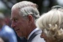 Britain's Prince Charles walks with wife Camilla, Duchess of Cornwall, to naming ceremony of Queen Elizabeth Terrace in Canberra