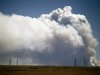 Smoke is visible from Tie Siding, Wyo., as a wildfire burns northwest of Fort Collins, Colo., on Saturday, June 9, 2012. The cause of the fire is not yet known. (AP Photo/Laramie Daily Boomerang, Andy Carpenean)