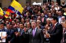Colombia's President Juan Manuel Santos, front, second from right, speaks after delivering to Congress the peace deal with rebels of the Revolutionary Armed Forces of Colombia, FARC, in Bogota, Colombia, Thursday, Aug. 25, 2016. Santos is moving fast to hold a national referendum on a peace deal meant to end a half-century conflict with leftist rebels, delivering the final text of the deal on Thursday to Congress and declaring a definitive ceasefire against the guerrillas.(AP Photo/Felipe Caicedo)